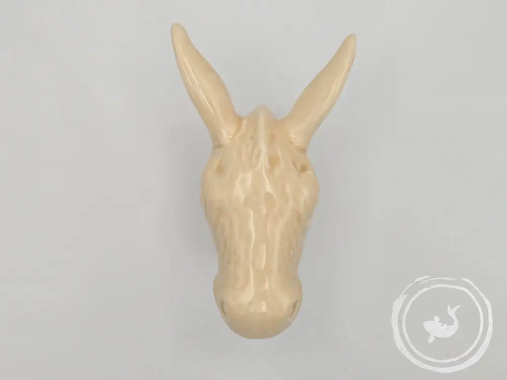 Ezelhoofdje Beige