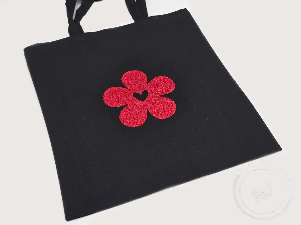 INTERIEURDINGETJES Glitterfiguren tas – simpel met een vleugje humor Bloem