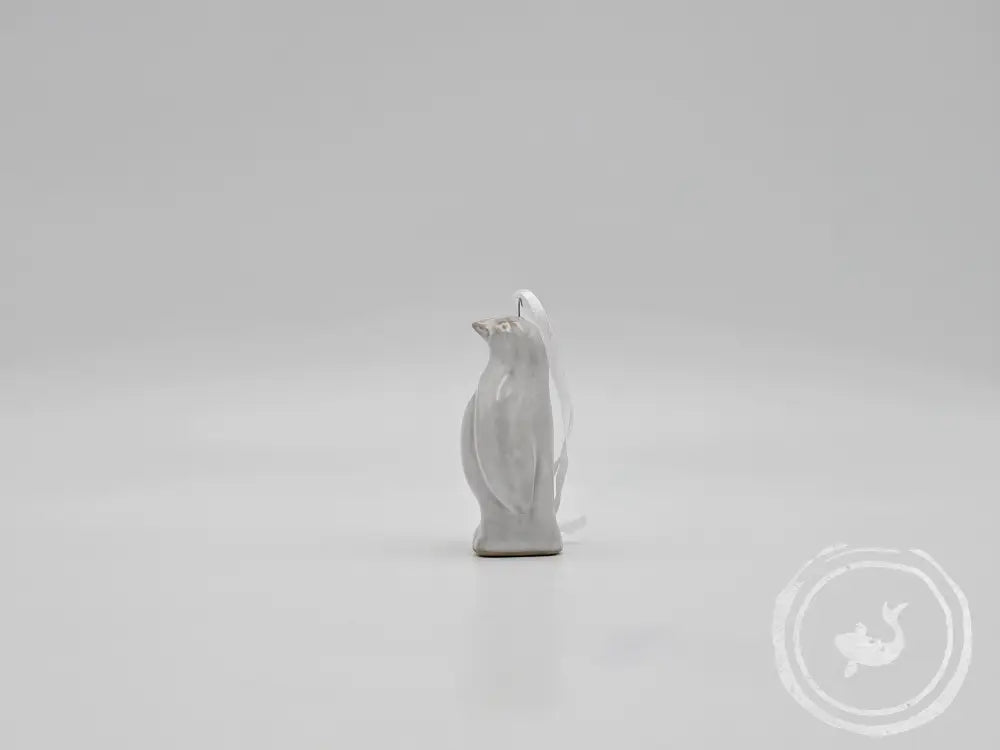 INTERIEURDINGETJES Pinguïn hanger – keramieken ornament met guitige blik